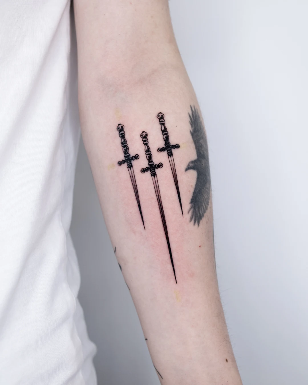 THREE SWORDS